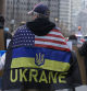 Demonstrators during a rally against Russia's invasion of Ukraine in Philadelphia, Pennsylvania, US, on Sunday, Feb. 26, 2023. Russian President Putin launched Europe's biggest military assault since World War II with hisinvasionof Ukraine a year ago, killing thousands of people, driving millions more from their homes, shaking the post-Cold War geopolitical order and roiling global markets. Photographer: Rachel Wisniewski/Bloomberg