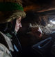 A Ukrainian service member is seen in a trench at a position on a front line, as Russia's attack on Ukraine continues, near the city of Bakhmut, Ukraine April 10, 2023. REUTERS/Oleksandr Klymenko