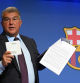 Barcelona's President Joan Laporta presents documents as he addresses a press conference at the Camp Nou stadium in Barcelona on April 17, 2023. - Barcelona have never 