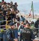FILE - Migrants disembark from a ship in the Sicilian port of Catania, Wednesday, April 12, 2023. European Union lawmakers approved on Thursday, April 20, 2023 a series of proposals aimed at ending the years-long standoff over how best to manage migration, a conundrum that has provoked one of the bloc's biggest political crises. (AP Photo/Salvatore Cavalli, File)