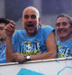 Soccer Football - Manchester City Victory Parade - Manchester, Britain - June 12, 2023 Manchester City manager Pep Guardiola is pictured smoking a cigar during the parade REUTERS/Phil Noble
