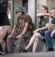 A member of Wagner group sits among local residents in a street in the city of Rostov-on-Don on June 24, 2023. President Vladimir Putin on June 24, 2023 said an armed mutiny by Wagner mercenaries was a 