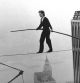FILE - In this Aug. 7, 1974, file photo, Philippe Petit, a French high wire artist, walks across a tightrope suspended between the World Trade Center's Twin Towers in New York. Petit and his companions surreptitiously strung a wire between New York City's recently constructed World Trade Towers on Aug. 6, 1974, and Petit walked across it the next day. He danced, strutted and clowned around for 45 minutes as startled bystanders watched from 110 stories below. The Frenchman's stunt is the subject of the 2008 documentary 