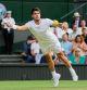 Spain's Carlos Alcaraz returns to Italy's Matteo Berrettini in a men's singles match on day eight of the Wimbledon tennis championships in London, Monday, July 10, 2023. (AP Photo/Alberto Pezzali)