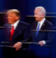 Trump y Biden reflejados en el plástico anticovid en un debate