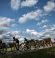 Jumbo-Visma's Danish rider Jonas Vingegaard wearing the overall leader's yellow jersey cycles ahead of the pack of riders during the 19th stage of the 110th edition of the Tour de France cycling race 173 km between Moirans-en-Montagne and Poligny, in the Jura department of central-eastern France, on July 21, 2023. (Photo by Anne-Christine POUJOULAT / AFP)