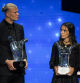 TOPSHOT - Manchester City's Norwegian striker Erling Haaland (L) and FC Barcelona's Spanish midfielder Aitana Bonmati (R) pose with their season 2022/2023 men's and women's player of the year awards during the UEFA Champions League group stage draw ceremony at The Grimaldi Forum in the Principality of Monaco, on August 31, 2023. (Photo by NICOLAS TUCAT / AFP)