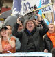 Picture released by AG La Plata showing the presidential candidate for La Libertad Avanza party, Javier Milei (C), waving a chainsaw between his sister Karina Milei (R) and Buenos Aires Province governor candidate Carolina Piparo, during a political rally in La Plata, Buenos Aires Province, Argentina, on September 12, 2023. Argentina holds presidential elections on October 22, 2023. With a month to go, the election remains eminently open and the economy at the heart of the debates, with a great divide between the ultraliberal Javier Milei's promise to 
