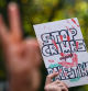A protester holds a sign during a demonstration in support of Palestinians in Gaza, as the conflict between Israel and Palestinian Islamist group Hamas continues, in Frankfurt, Germany, October 21, 2023. REUTERS/Kai Pfaffenbach