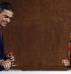 Spain's acting Prime Minister and Secretary General of the Socialist Party Pedro Sanchez (L) and the acting labour minister and founder of the alliance of far-left parties Sumar, Yolanda Diaz, take their pens to sign an agreement to form a coalition government in Madrid on October 24, 2023. The agreement to form a coalition government sealed today by Spain's Socialist party and hard-left Sumar is a key step to reinstating acting Prime Minister Pedro Sanchez for another term. Spain is in political limbo since an inconclusive July general election which was won by the conservative Popular Party (PP) but without enough support to form a government. (Photo by OSCAR DEL POZO / AFP)