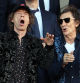 Mick Jagger y and Ronnie Wood en el palco del Estadi Olímpic Lluís Companys