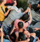 EDITORS NOTE: Graphic content / TOPSHOT - A man reacts as the body of his brother is removed from under the rubble of a building destroyed by an Israeli strike on the Al-Maghazi refugee camp in Deir Balah in the central Gaza Strip, on November 5, 2023. One month after Israel was wracked by Hamas attacks, life has been upended for both the Palestinians and Israel after it launched a war of reprisal in the Gaza Strip. The October 7 attacks by Hamas militants who stormed across from Gaza and struck kibbutzim and southern Israeli areas killed 1,400 people, mostly civilians, and deeply scarred the nation. The health ministry in Hamas-run Gaza says nearly 9,500 have been killed, two-thirds of them women and children, and mostly civilians. (Photo by MAHMUD HAMS / AFP)