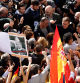 Partido Popular (PP) leader Alberto Nunez Feijoo (C,R) meets supporters during a protest called by right-wing opposition against an amnesty bill for people involved with Catalonia's failed 2017 independence bid, on Puerta del Sol square in Madrid on November 12, 2023. Right-wingers and far-right demonstrators have gathered in Madrid in tense protests for a week, against the government's proposed law granting amnesty to Catalan separatists. (Photo by OSCAR DEL POZO / AFP)