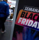 People walk past a sign advertising pre-Black Friday offers, in Barakaldo, Spain, November 15, 2023. REUTERS/Vincent West