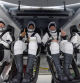 This handout image courtesy of NASA and made available on May 2, 2021, shows NASA astronauts from left:- Shannon Walker, Victor Glover, Mike Hopkins, and Japan Aerospace Exploration Agency (JAXA) astronaut Soichi Noguchi, strapped in their seats inside the SpaceX Crew Dragon Resilience spacecraft onboard the SpaceX GO Navigator recovery ship shortly after having landed in the Gulf of Mexico off the coast of Panama City, Florida, on May 2, 2021. - NASAs SpaceX Crew-1 mission was the first crew rotation flight of the SpaceX Crew Dragon spacecraft and Falcon 9 rocket with astronauts to the International Space Station as part of the agencys Commercial Crew Program. (Photo by Bill INGALLS / (NASA/Bill Ingalls) / AFP) / RESTRICTED TO EDITORIAL USE - MANDATORY CREDIT