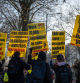 LONDON, ENGLAND - DECEMBER 6: Anti-vaccine protesters hold placards as they demonstrate outside the Covid Inquiry on the day that Boris Johnson, Britain's former Prime Minister, is due to testify, on December 6, 2023 in London, England. Britain's former Prime Minister will be questioned during phase 2 of the Covid-19 Inquiry over government decision-making during the pandemic. (Photo by Carl Court/Getty Images)