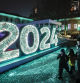 Moscow (Russian Federation), 22/12/2023.- A woman walks with her children past a '2024' light installation during the opening of the New Year and Christmas festival 'Moscow Estates. Winter' in Moscow, Russia, 22 December 2023. The festival will run from 22 December to 08 January 2024 at 15 venues in Moscow. It includes more than 400 events, New Year and Christmas balls, children's performances, lectures, folklore festivities, quests, and tea parties. Russians are preparing to celebrate New Year's Eve on 31 December and Christmas, observed on 07 January, according to the Russian Orthodox Julian calendar. (Rusia, Moscú) EFE/EPA/YURI KOCHETKOV