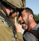 A Palestinian protester argues with an Israeli soldier during a protest against Israeli settlement activity in Qalqilya in the Israeli-occupied West Bank June 9, 2022. REUTERS/Mohamad Torokman TPX IMAGES OF THE DAY