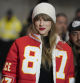 Taylor Swift wears a Kansas City Chiefs tight end Travis Kelce jacket as she arrives before an NFL wild-card playoff football game between the Chiefs and the Miami Dolphins Saturday, Jan. 13, 2024, in Kansas City, Mo. (AP Photo/Ed Zurga)