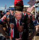 A participant of 'Take Back Our Border' trucker convoy rally against migrants crossing from Mexico, wears a Trump t-shirt during the event in Quemado, Texas, U.S., February 3, 2024. REUTERS/Go Nakamura TPX IMAGES OF THE DAY