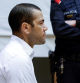 FILE PHOTO: Brazil soccer player Dani Alves sits in court during the first day of his trial in Barcelona, Spain, February 5, 2024. Alberto Estevez/Pool via REUTERS/File Photo