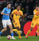 Naples (Italy), 21/02/2024.- Napoli'Äôs forward Khvicha Kvaratskhelia (L) in action during the UEFA Champions League Round of 16, 1st leg soccer match SSC Napoli vs FC Barcelona at Diego Armando Maradona stadium in Naples, Italy, 21 February 2024. (Liga de Campeones, Italia, Nápoles) EFE/EPA/CIRO FUSCO