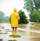 Woman standing in a flooded street