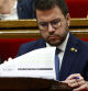 GRAFCAT1270. BARCELONA, 13/03/2024.- El presidente de la Generalitat, Pere Aragonès, consulta el documento de los presupuestos durante el debate de totalidad de los presupuestos de la Generalitat para 2024 en el Parlamento de Cataluña, que se celebra sin que de momento el presidente Aragonès haya podido atar el apoyo de los comunes a las cuentas. EFE/Quique García