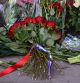 Flowers are pictured outside the Russian embassy in London on March 23, 2024, a day after a gun attack in Krasnogorsk, outside Moscow. Camouflaged assailants opened fire at the packed Crocus City Hall in Moscow's northern suburb of Krasnogorsk on March 22, 2024, ahead of a concert by Soviet-era rock band Piknik in the deadliest attack in Russia for at least a decade. Russia on March 23, 2024, said it had arrested 11 people - including four gunmen - over the attack on a Moscow concert hall claimed by Islamic State, as the death toll rose to 115 people. (Photo by JUSTIN TALLIS / AFP)