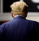 Former U.S. President Donald Trump walks towards the courtroom for the start of the second day of his trial in Manhattan Criminal Court, New York City, New York, U.S. April 16, 2024.  Michael M. Santiago/Pool via REUTERS     TPX IMAGES OF THE DAY