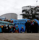 Supporters and members of the association Senior Women for Climate Protection hold banners as they arrive for the ruling in the climate case Verein KlimaSeniorinnen Schweiz and Others v. Switzerland, at the European Court of Human Rights (ECHR) in Strasbourg, France, April 9, 2024. REUTERS/Christian Hartmann