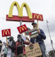 Johannesburg (South Africa), 15/04/2024.- Supporters of the Free Palestine Movement picket outside a branch of McDonald's fast food in protest to the ongoing conflict in Gaza, Johannesburg, South Africa, 15 April 2024. The group are calling on McDonald's customers to boycott the fast food chain claiming the United States related businesses are complicit in their claimed genocide in Gaza due to the fact that the United States supports Israel politically and militarily. (Protestas, Sudáfrica, Estados Unidos, Johannesburgo) EFE/EPA/Kim Ludbrook