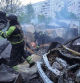Firefighters work at the site of a Russian air strike, amid Russia's attack on Ukraine, in Kharkiv, Ukraine May 14, 2024. REUTERS/Sofiia Gatilova