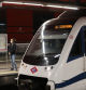 Una mujer espera la llegada de un tren de Metro de Madrid en uno de los andenes de la estación de Nuevos Ministerios.