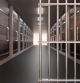 Prison building corridor, jail cell and open metal bars door, empty dark facility hall interior. Conviction and incarceration concept, 3d render
