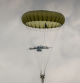 SANNERVILLE, FRANCE - JUNE 05: Paratroopers from the British, Belgian, Canadian and US military take part in a parachute drop in the fields of Sannerville as they reenact the D-Day landings of 80 years ago on the war time area code named area 'K' on June 05, 2024 in Sannerville, France. Veterans, families, visitors and military personnel are gathering in Normandy on June 6th to commemorate the 80th anniversary of the Normandy Landings which heralded the Allied advance towards Germany and victory in Europe 11 months later. (Photo by Christopher Furlong/Getty Images)