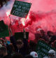 People attend a demonstration after partial results in the second round of the early French parliamentary elections,  in Nantes, France, July 7, 2024. The slogan reads 