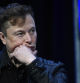 FILE - Tesla and SpaceX chief executive officer Elon Musk listens to a question as he speaks at the SATELLITE Conference and Exhibition in Washington, March 9, 2020. A Delaware judge heard arguments Monday, July 8, 2024, over a massive and unprecedented fee request by lawyers who argued that a massive and unprecedented pay package for Tesla CEO Musk was illegal and should be voided. (AP Photo/Susan Walsh, File)