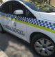 Policía Local de Málaga, coche patrulla, barrio