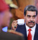 CARACAS, VENEZUELA - AUGUST 2: President Nicolas Maduro holds a cup before a press conference after testifying before the electoral chamber at the main headquarters of the Supreme Court of Justice (TSJ) on August 2, 2024 at the Miraflores presidential palace in Caracas, Venezuela. Nicolas Maduro was declared as winner of the 2024 presidential election by the National Electoral Council while opposition leader Maria Corina Machado and candidate Edmundo Gonzalez claimed that the final result was not what Venezuelans decided during the election. Maduro requested the Supreme Tribunal of Justice to investigate the election to confirm his victory. (Photo by Jesus Vargas/Getty Images)