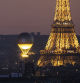 PARIS, FRANCE - AUGUST 10: Olympic cauldron as it rises high near Eiffel tower on day fifteen of the Olympic Games Paris 2024 at on August 10, 2024 in Paris, France. (Photo by Maja Hitij/Getty Images)
