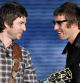 Noel y Liam Gallagher, durante un concierto en Italia