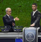 UEFA's Giorgio Marchetti directs player Cristiano Ronaldo to press a button to proceed with the Champions League, league phase, draw, in Monaco, Thursday, Aug. 29, 2024.