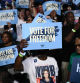 TOPSHOT - Supporters wait for US Vice President and Democratic presidential candidate Kamala Harris at a campaign rally at East Carolina University in Greenville, North Carolina, on October 13, 2024. (Photo by Brendan SMIALOWSKI / AFP)