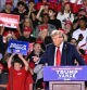 Former US President and Republican presidential candidate Donald Trump points as he speaks during a campaign rally at Huntington Place in Detroit, Michigan, October 18, 2024. (Photo by Jim WATSON / AFP)