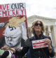 WASHINGTON, DISTRICT OF COLUMBIA, UNITED STATES - 2024/04/25: An activist holding a sign with Save Our Democracy written on it stands outside the US Supreme Court, as the court prepares to hear arguments on the immunity of former US President Donald Trump in Washington, DC. (Photo by Probal Rashid/LightRocket via Getty Images)