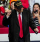 Republican presidential nominee former President Donald Trump dances at a campaign rally at Atrium Health Amphitheater Sunday, Nov. 3, 2024, in Macon, Ga. (AP Photo/Mike Stewart)