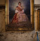 A painting hangs near the water level marker in an area affected by floods in Paiporta, Valencia, Spain, Tuesday, Nov. 5, 2024. (AP Photo/Emilio Morenatti)
