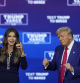 Republican presidential nominee former President Donald Trump and South Dakota Gov. Kristi Noem dance to the song