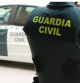 Un agente de la Guardia Civil de espaldas en imagen de archivo.